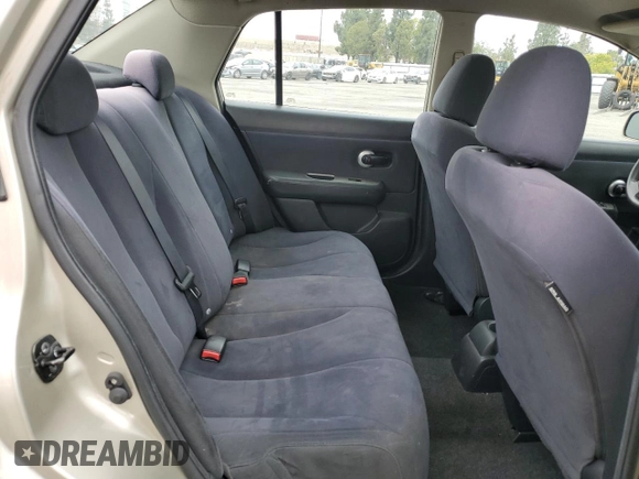 2009 Nissan Versa S with VIN 3N1BC11E79L433933, listed as a Copart auction lot 54953675 with 196,785 mi miles and Salvage Title. Bid and sale history available at DreamBid. Image 10.
