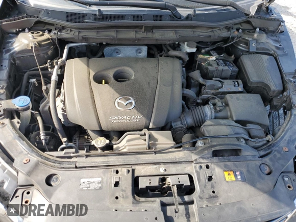 2016 Mazda CX-5 Sport with VIN JM3KE4BY6G0749973, listed as a Copart auction lot 54131635 with 97,480 mi miles and Salvage title. Bid and sale history available at DreamBid. Image 12.