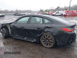 2024 BMW i4 M50 z VIN WBY33AW00RFS06591, wystawiony jako IAAI lot #41863252 z przebiegiem 15 260 mil mil oraz . Historia ofert i sprzedaży dostępna na DreamBid. Obrazek 20.