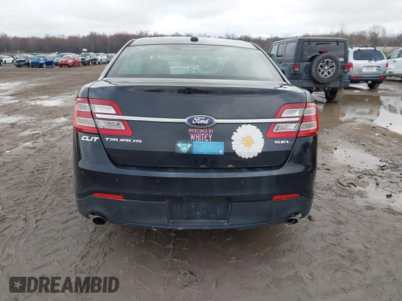 2013 Ford Taurus SEL with VIN 1FAHP2E87DG180296, listed as a IAAI auction lot 42016506 with 137,352 mi miles. Bid and sale history available at carsss.com. Image 16.