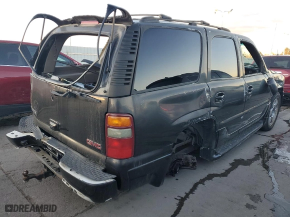 2001 GMC Yukon Denali with VIN 1GKEK63U51J184935, listed as a Copart auction lot 79268634 with 320,366 mi miles and Salvage Title. Bid and sale history available at carsss.com. Image 3.