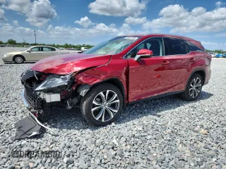 2021 Lexus RX 350L with VIN JTJHZKEA6M2018970, listed as a Copart auction lot 58027705 with 65,070 mi miles and Salvage title. Bid and sale history available at DreamBid. Image 1.
