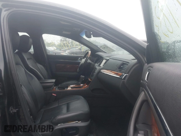 2013 Lincoln MKS EcoBoost with VIN 1LNHL9FT4DG607785, listed as a IAAI auction lot 42279833 with 126,548 mi miles and . Bid and sale history available at DreamBid. Image 5.