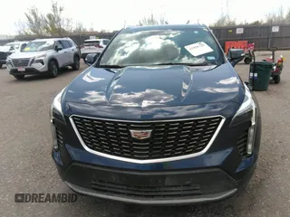 2021 Cadillac XT4 FWD Premium Luxury with VIN 1GYFZCR48MF004009, listed as a IAAI auction lot 41956723 with 82,483 mi miles. Bid and sale history available at carsss.com. Image 12.