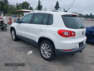2010 Volkswagen Tiguan with VIN WVGBV9AX2AW513478, listed as a IAAI auction lot 42607466 with 63,780 mi miles and . Bid and sale history available at DreamBid. Image 3.