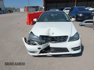 2015 Mercedes-Benz C-Class C 250 with VIN WDDGJ4HB1FG403788, listed as a IAAI auction lot 40495537 with 129,832 mi miles. Bid and sale history available at carsss.com. Image 12.
