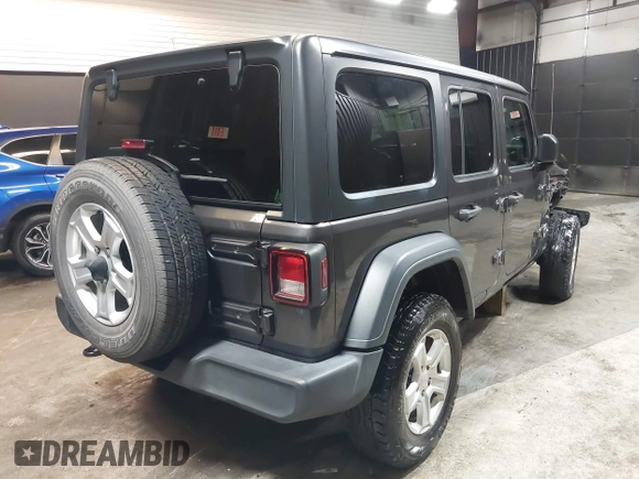 2018 Jeep Wrangler Unlimited Sport S with VIN 1C4HJXDG5JW126496, listed as a IAAI auction lot 42390584 with 163,476 mi miles and . Bid and sale history available at DreamBid. Image 4.