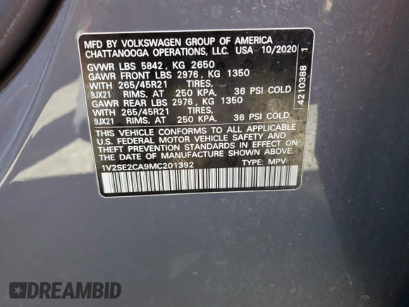 2021 Volkswagen Atlas SEL z VIN 1V2SE2CA9MC201392, wystawiony jako Copart lot #66317304 z przebiegiem Nie podano mil oraz Szkoda całkowita • Salvage title. Historia ofert i sprzedaży dostępna na DreamBid. Obrazek 14.