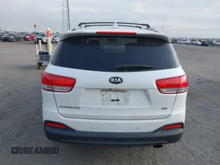 2017 Kia Sorento LX with VIN 5XYPG4A35HG205801, listed as a IAAI auction lot 42143064 with 129,647 mi miles. Bid and sale history available at carsss.com. Image 16.
