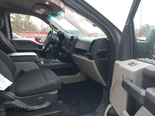 2018 Ford F-150 XL with VIN 1FTEW1CP4JFD00156, listed as a IAAI auction lot 41571979 with 153,167 mi miles. Bid and sale history available at carsss.com. Image 5.
