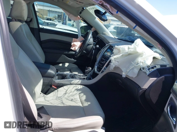 2014 Cadillac SRX Performance Collection with VIN 3GYFNCE38ES675508, listed as a IAAI auction lot 41969292 with 147,534 mi miles and . Bid and sale history available at DreamBid. Image 5.