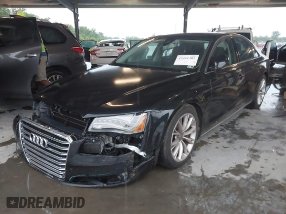 2012 Audi A8 with VIN WAUAVAFD9CN006499, listed as a IAAI auction lot 42461402 with 57,232 mi miles and . Bid and sale history available at DreamBid. Image 17.