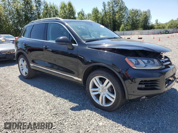 2013 Volkswagen Touareg Lux with VIN WVGEF9BP0DD001565, listed as a Copart auction lot 63070845 with 123,788 mi miles and Salvage title. Bid and sale history available at DreamBid. Image 4.