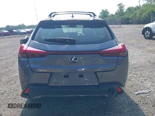 2021 Lexus UX 250h F Sport z VIN JTHE9JBHXM2045377, wystawiony jako IAAI lot #42580566 z przebiegiem 52 838 mil mil oraz . Historia ofert i sprzedaży dostępna na DreamBid. Obrazek 17.