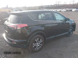 2018 Toyota RAV4 LE with VIN 2T3BFREVXJW711993, listed as a IAAI auction lot 41904430 with 190,191 mi miles. Bid and sale history available at carsss.com. Image 4.