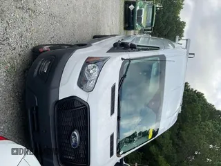 2023 Ford Transit Cargo with VIN 1FTBR1X81PKA75434, listed as a IAAI auction lot 42742887 with 5,111 mi miles and . Bid and sale history available at DreamBid. Image 3.