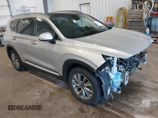 2019 Hyundai Santa Fe Ultimate z VIN 5NMS5CAD2KH130605, wystawiony jako IAAI lot #42144227 z przebiegiem 64 666 mil mil oraz . Historia ofert i sprzedaży dostępna na DreamBid. Obrazek 1.