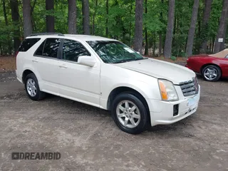 2007 Cadillac SRX z VIN 1GYEE637270136539, wystawiony jako IAAI lot #42486340 z przebiegiem 121 110 mil mil oraz . Historia ofert i sprzedaży dostępna na DreamBid. Obrazek 1.