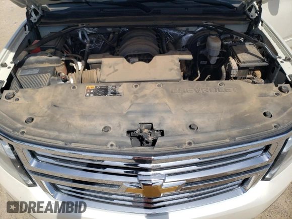 2015 Chevrolet Suburban LTZ with VIN 1GNSKKKC1FR659707, listed as a Copart auction lot 50202895 with 91,680 mi miles and Salvage Title. Bid and sale history available at DreamBid. Image 14.