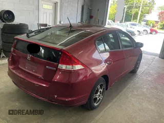 2010 Honda Insight LX z VIN JHMZE2H59AS032860, wystawiony jako Copart lot #60861945 z przebiegiem 253 444 mil mil oraz Czysty tytuł • Clean title. Historia ofert i sprzedaży dostępna na DreamBid. Obrazek 4.