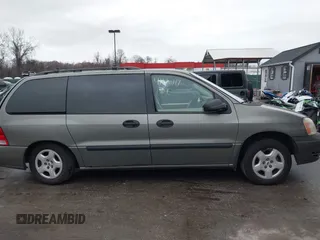 2005 Ford Freestar SE z VIN 2FMZA51625BA54311, wystawiony jako IAAI lot #41120117 z przebiegiem 139 647 mil mil oraz . Historia ofert i sprzedaży dostępna na DreamBid. Obrazek 14.