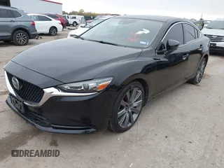 2020 Mazda 6 Grand Touring with VIN JM1GL1TY5L1513949, listed as a IAAI auction lot 40953540 with 55,616 mi miles and . Bid and sale history available at DreamBid. Image 17.