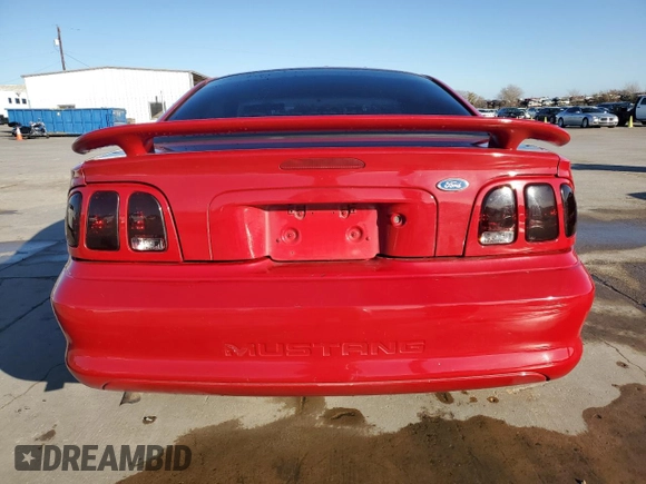 1996 Ford Mustang with VIN 1FALP4041TF234741, listed as a Copart auction lot 85277894 with 113,353 mi miles and Salvage Title. Bid and sale history available at carsss.com. Image 6.