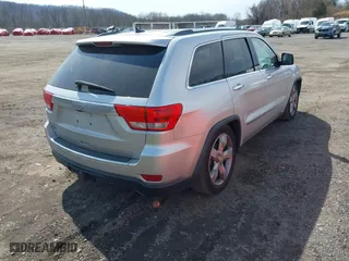 2012 Jeep Grand Cherokee Overland with VIN 1C4RJFCGXCC292257, listed as a IAAI auction lot 41844192 with 182,522 mi miles. Bid and sale history available at carsss.com. Image 4.