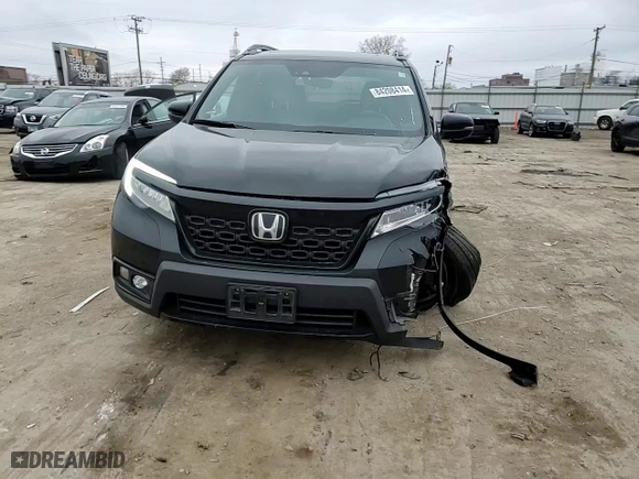 2021 Honda Passport Elite with VIN 5FNYF8H03MB027396, listed as a Copart auction lot 84208414 with 56,641 mi miles and Salvage Title. Bid and sale history available at carsss.com. Image 12.