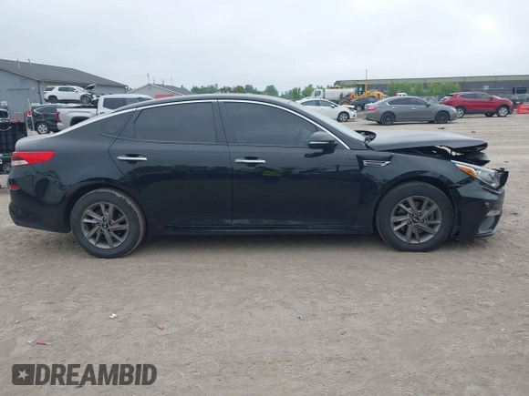 2020 Kia Optima LX with VIN 5XXGT4L37LG445597, listed as a IAAI auction lot 42404651 with 56,851 mi miles and . Bid and sale history available at DreamBid. Image 13.