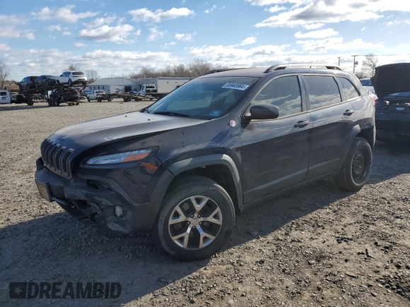 2014 Jeep Cherokee Trailhawk with VIN 1C4PJMBB6EW285745, listed as a Copart auction lot 86968964 with 125,922 mi miles and Salvage Title. Bid and sale history available at carsss.com. Image 1.