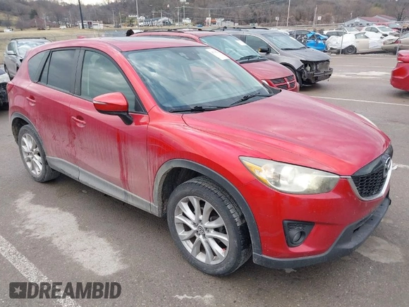 2015 Mazda CX-5 Grand Touring with VIN JM3KE4DY1F0540586, listed as a IAAI auction lot 41710216 with 148,800 mi miles. Bid and sale history available at carsss.com. Image 1.