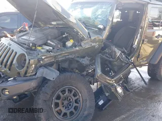 2015 Jeep Wrangler Unlimited Rubicon with VIN 1C4BJWFG0FL623431, listed as a IAAI auction lot 41651317 with 105,508 mi miles. Bid and sale history available at carsss.com. Image 6.