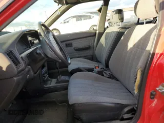 1990 Toyota Corolla z VIN 1NXAE94A6LZ127972, wystawiony jako Copart lot #80673204 z przebiegiem 186 993 mil mil oraz Szkoda całkowita • Salvage title. Historia ofert i sprzedaży dostępna na DreamBid. Obrazek 7.