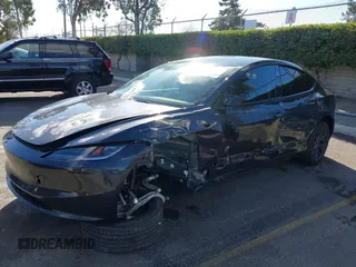 2024 Tesla Model 3 with VIN 5YJ3E1EA0RF718703, listed as a IAAI auction lot 41278243 with 6,504 mi miles. Bid and sale history available at carsss.com. Image 2.