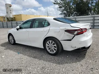 2024 Toyota Camry LE with VIN 4T1C11AK1RU856375, listed as a Copart auction lot 51189005 with 50,574 mi miles and Clean Title. Bid and sale history available at carsss.com. Image 2.