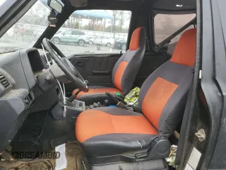 1992 Geo Tracker z VIN 2CNBJ18U8N6938728, wystawiony jako Copart lot #79459914 z przebiegiem 17 751 mil mil oraz Szkody całkowita. Historia ofert i sprzedaży dostępna na DreamBid. Obrazek 7.