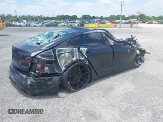 2021 Tesla Model S Plaid с VIN 5YJSA1E63MF451438, выставлен на аукционе IAAI как лот 41399777 с пробегом Не указан миль и . История ставок и продаж доступна на DreamBid. Изображение 4.