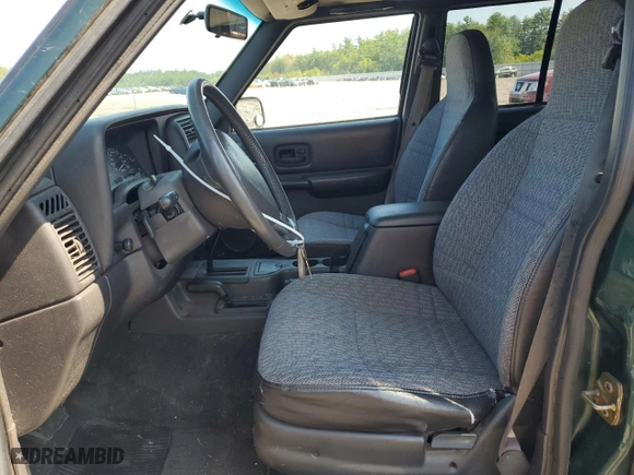 2000 Jeep Cherokee Police with VIN 1J4FF48S5YL199900, listed as a Copart auction lot 70271314 with 176,806 mi miles and Salvage Title. Bid and sale history available at carsss.com. Image 7.