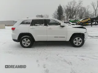 2017 Jeep Grand Cherokee Laredo with VIN 1C4RJEAG9HC854492, listed as a IAAI auction lot 41184619 with 134,839 mi miles. Bid and sale history available at carsss.com. Image 13.