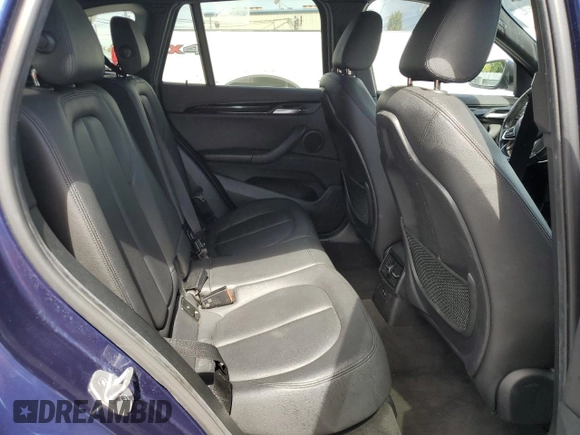 2020 BMW X1 xDrive28i with VIN WBXJG9C0XL5R33141, listed as a Copart auction lot 63040155 with 165,172 mi miles and Clean title. Bid and sale history available at DreamBid. Image 11.