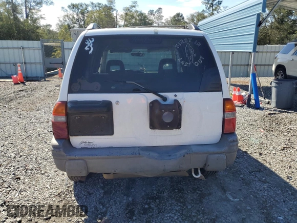 2003 Chevrolet Tracker z VIN 2CNBE13C736912038, wystawiony jako Copart lot #80422844 z przebiegiem 242 512 mil mil oraz Szkoda całkowita • Salvage title. Historia ofert i sprzedaży dostępna na DreamBid. Obrazek 6.