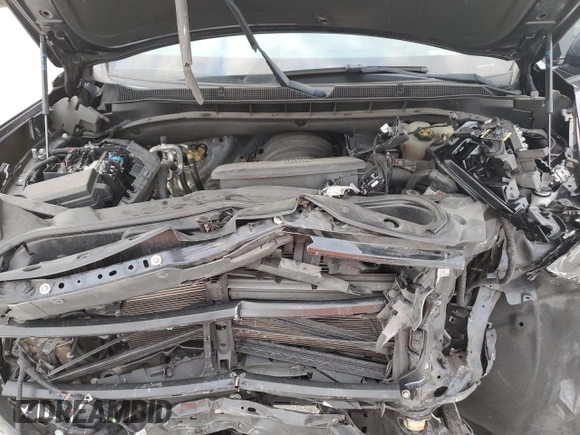 2021 Chevrolet Tahoe LS z VIN 1GNSCMKD5MR229435, wystawiony jako Copart lot #81240864 z przebiegiem 103 660 mil mil oraz Nie do naprawy • Non repairable. Historia ofert i sprzedaży dostępna na DreamBid. Obrazek 14.