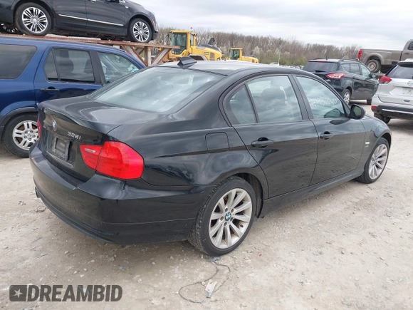 2011 BMW 3 Series 328i xDrive with VIN WBAPK7C50BA816306, listed as a IAAI auction lot 41950040 with 243,166 mi miles. Bid and sale history available at carsss.com. Image 4.
