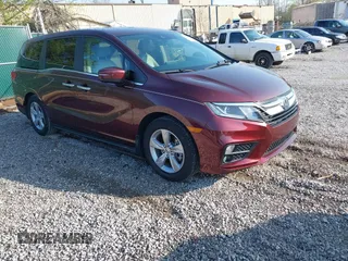 2019 Honda Odyssey EX-L z VIN 5FNRL6H75KB116656, wystawiony jako IAAI lot #41870961 z przebiegiem 87 697 mil mil oraz . Historia ofert i sprzedaży dostępna na DreamBid. Obrazek 1.