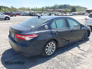 2019 Toyota Camry LE z VIN 4T1B11HK7KU269928, wystawiony jako IAAI lot #42048750 z przebiegiem 102 585 mil mil oraz . Historia ofert i sprzedaży dostępna na DreamBid. Obrazek 4.