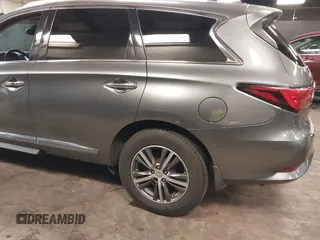 2016 Infiniti QX60 with VIN 5N1AL0MM1GC526389, listed as a IAAI auction lot 41704458 with 103,931 mi miles and . Bid and sale history available at DreamBid. Image 6.