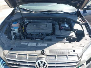 2014 Volkswagen Passat Wolfsburg Ed with VIN 1VWAS7A34EC032338, listed as a IAAI auction lot 42013753 with 116,168 mi miles. Bid and sale history available at carsss.com. Image 10.
