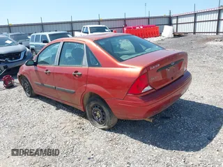 2000 Ford Focus LX with VIN 1FAFP33P8YW187843, listed as a IAAI auction lot 41947575 with Not Provided miles and . Bid and sale history available at carsss.com. Image 3.