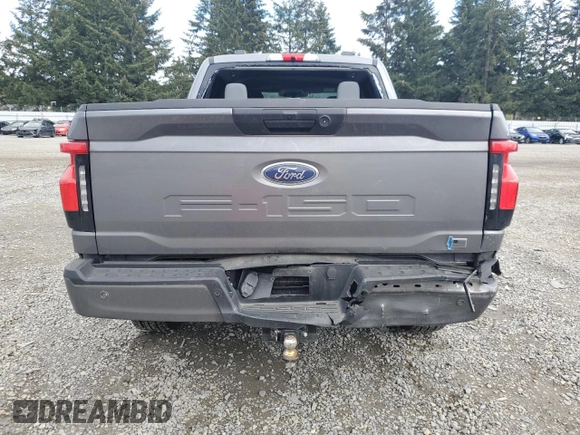 2023 Ford F-150 Lightning Pro with VIN 1FTVW1EL8PWG38419, listed as a Copart auction lot 47630535 with 11,940 mi miles and Salvage Title. Bid and sale history available at DreamBid. Image 6.